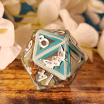 'In All My Dreams I Drown’ Liquid Core Glow in the Dark Handmade Resin 30mm D20 Polyhedral Gaming Dice Chonk
