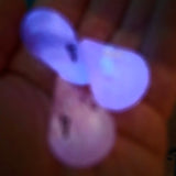 'Wibble Wobble Oloid' Glow in the Dark Shimmery Rainbow Handmade Resin Alternative Shape D4 TTRPG Gaming Dice