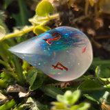 'Wibble Wobble Oloid' Glow in the Dark Shimmery Rainbow Handmade Resin Alternative Shape D4 TTRPG Gaming Dice